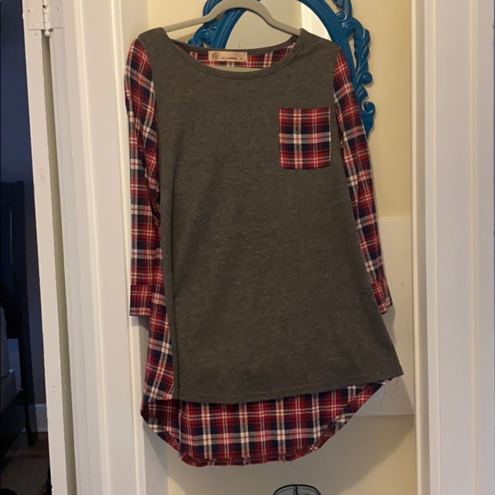 Red and grey plaid tunic.
